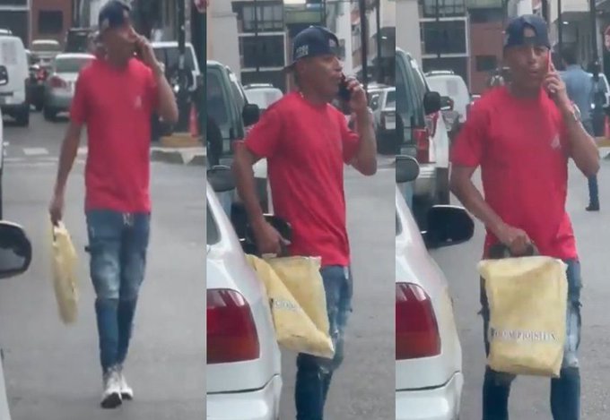Transeúnte logró captar el momento en que un sujeto roba un retrovisor en plena calle de Caracas