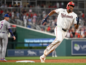Woods impulsa triunfo de Nacionales con Grand Slam dentro del parque
